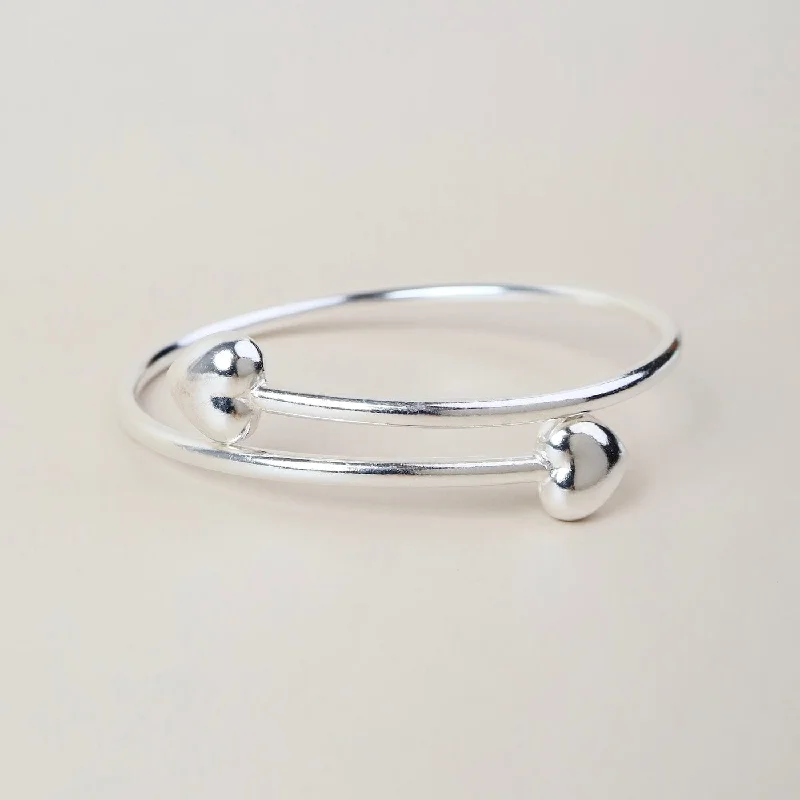 Luxury Silver Bangles with Garnet Inlays-Sterling Silver By-Pass Bangle with Heart Ends