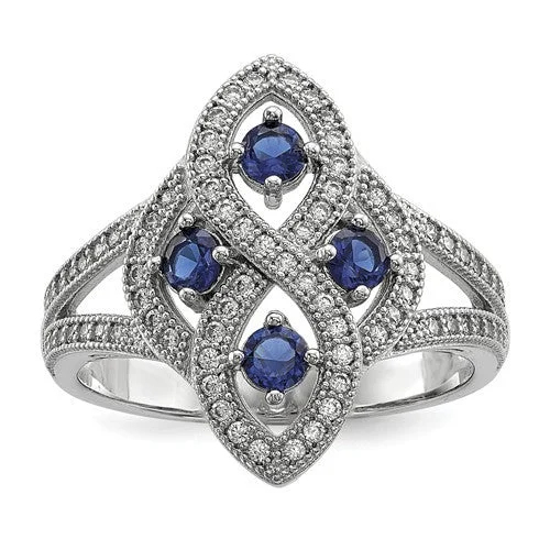 Elegant Gold Wedding Ring with Diamond Detail-Sterling Silver Simulated Blue Sapphire & CZ Brilliant Embers Ring